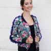 Bomber with rosa print and ruffle details